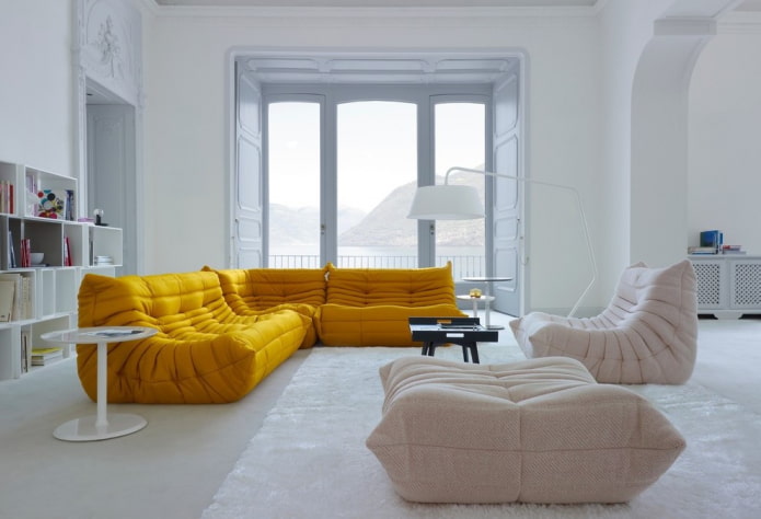 sofa in bright yellow color in the interior