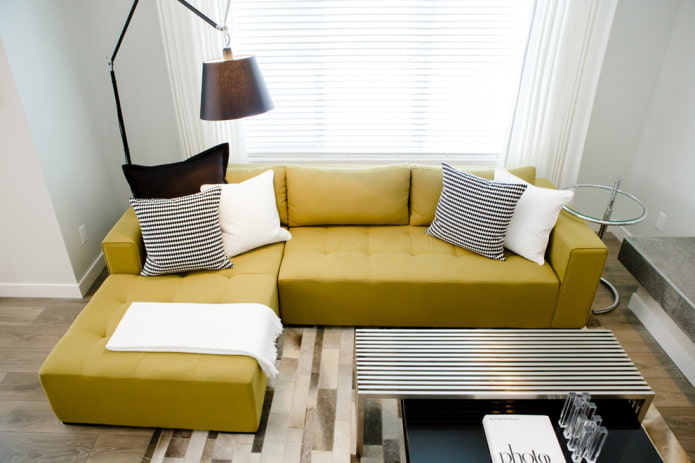 mustard-colored sofa in the interior