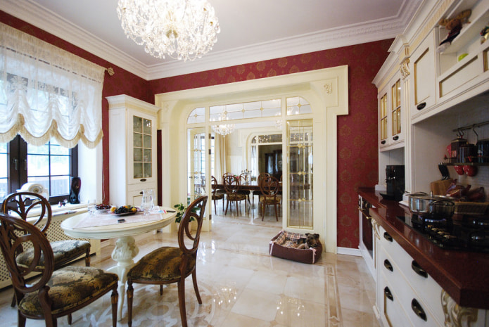 the walls in the kitchen are decorated with burgundy and gold wallpaper