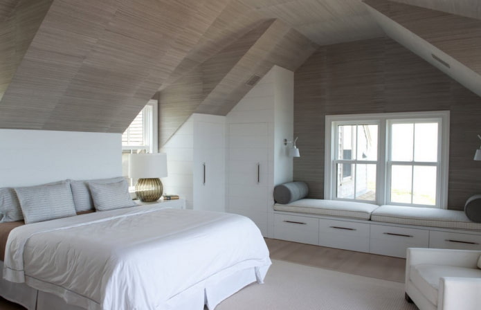 attic with ceiling wallpaper