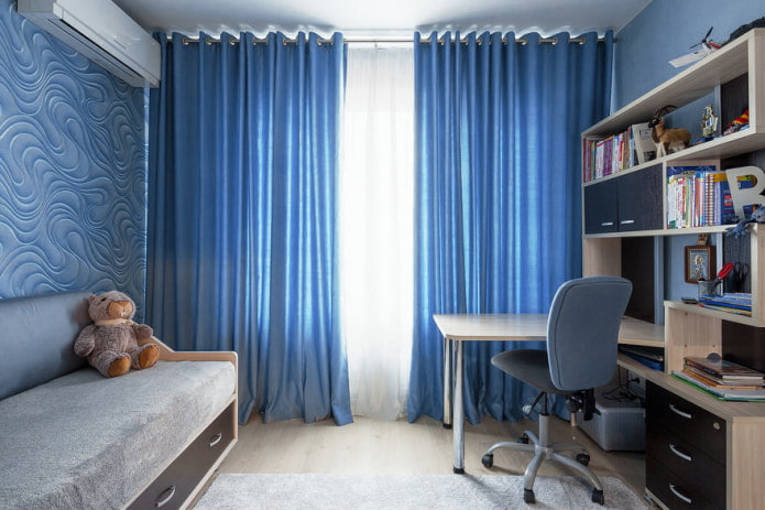 blue curtains on eyelets in the nursery