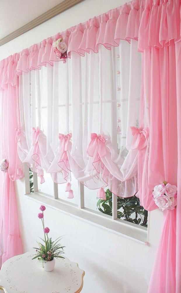 pink curtains of different lengths