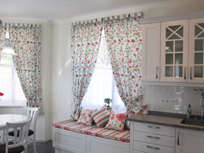 curtains with a small floral print in the kitchen