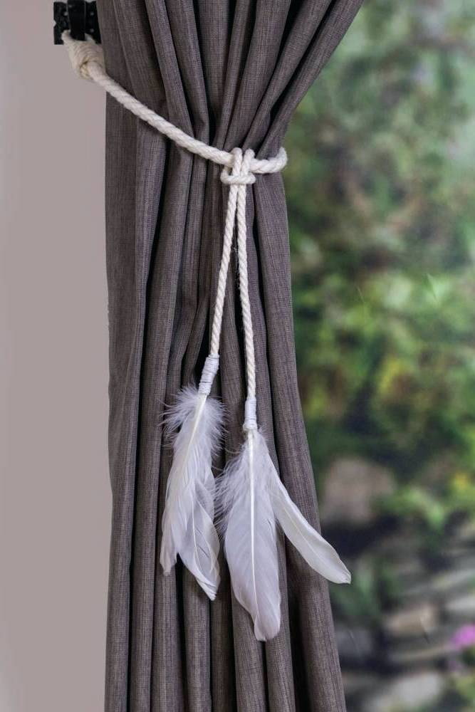 curtain decorated with white tie-back