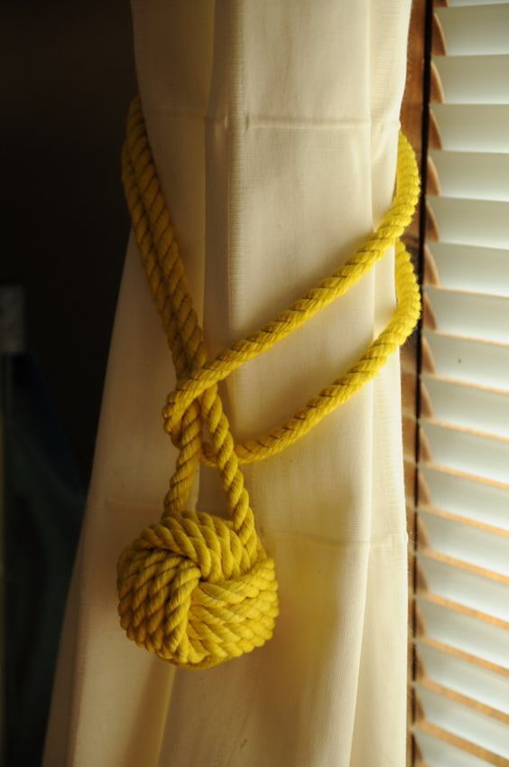 yellow curtain holder