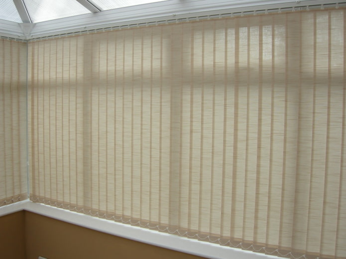 beige vertical blinds on the balcony