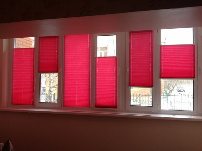 red pleated blinds on the loggia