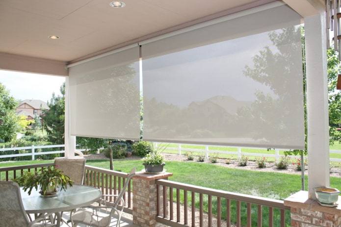 veranda decorated with roller blinds