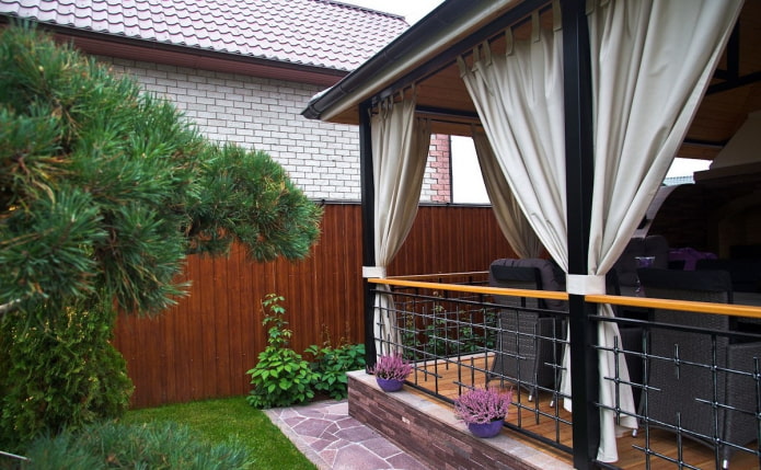 veranda with tarpaulin curtains