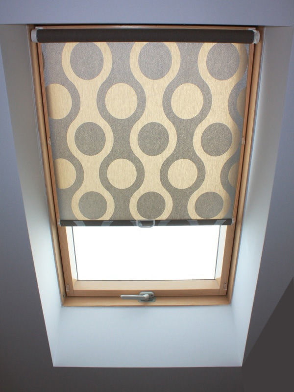 roller blinds with geometric patterns on the roof window
