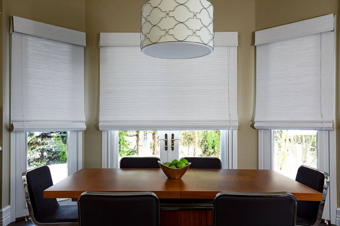 white roman blinds made of bamboo in the interior