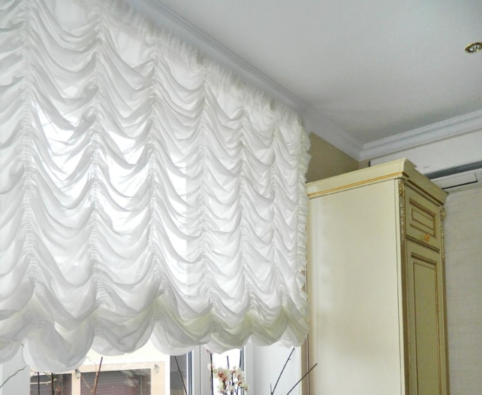 white awning curtains in the interior