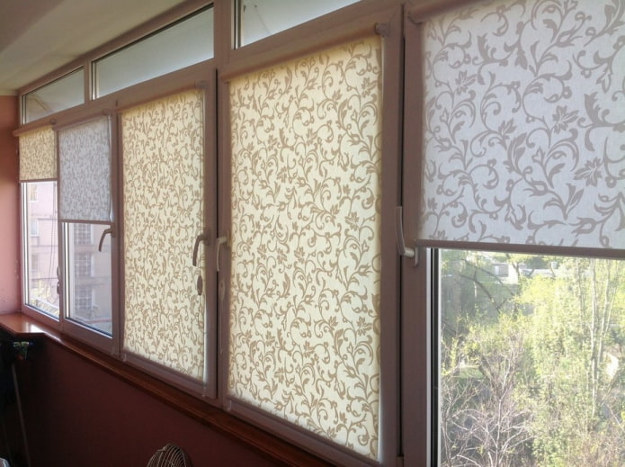 fabric roller blinds on the loggia