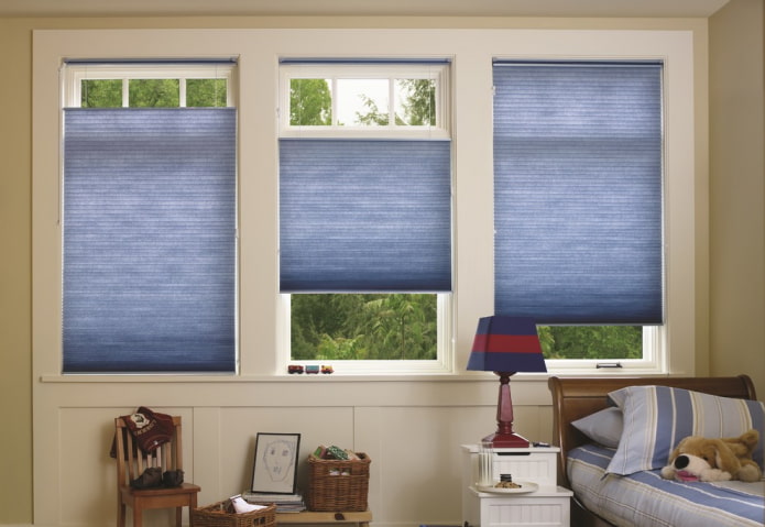 blue pleated blinds in the nursery