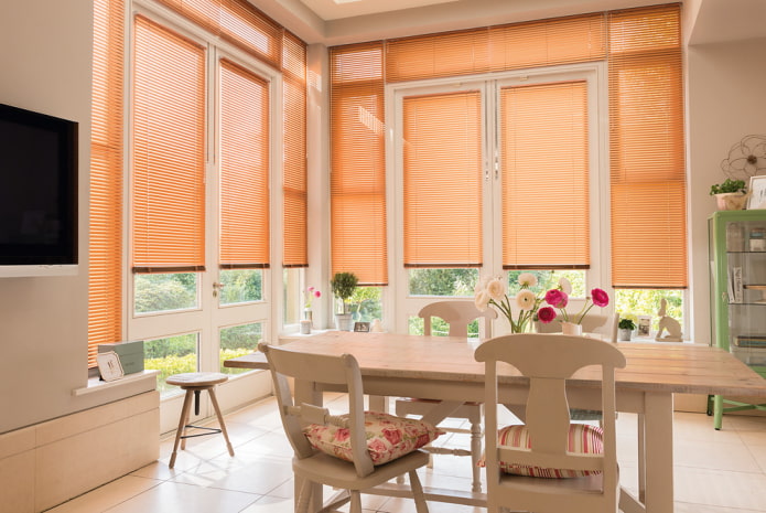 orange horizontal blinds in the dining room