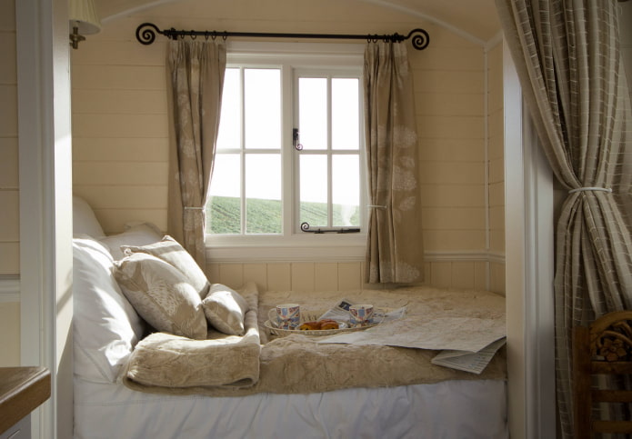 cornice with curtains in the interior of the bedroom