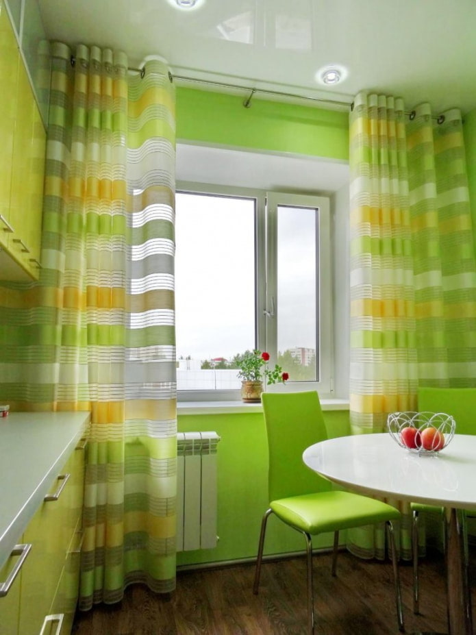 curtains on eyelets in the interior of the kitchen
