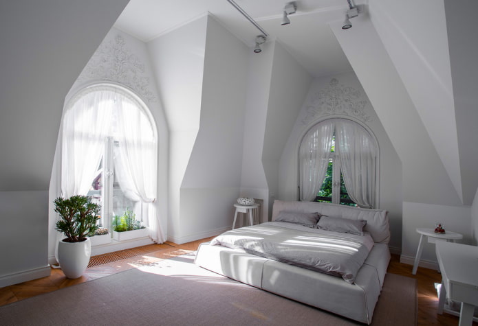 curtains on arched windows in the bedroom