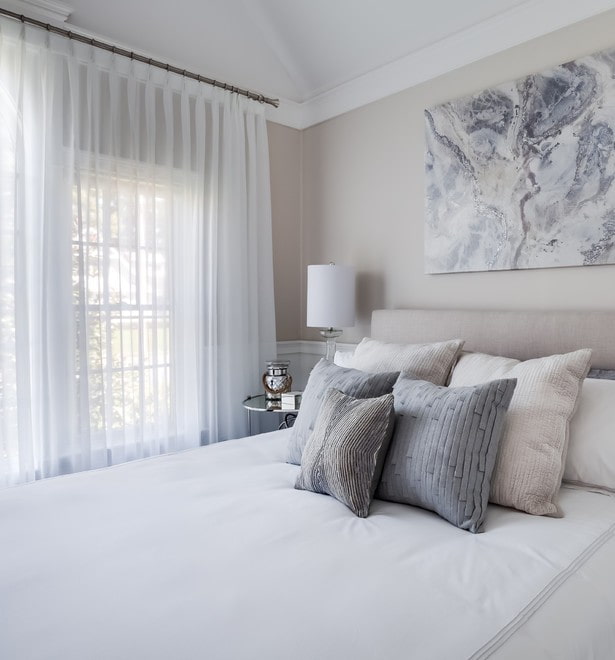white curtains in the interior of the bedroom