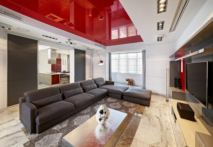spacious red and white living room