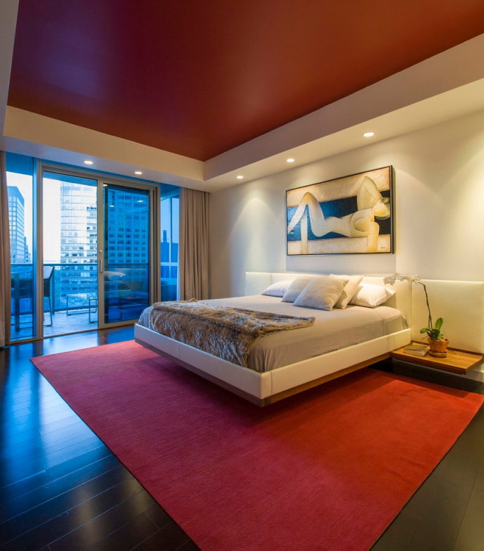 bedroom with red carpet in the color of the ceiling
