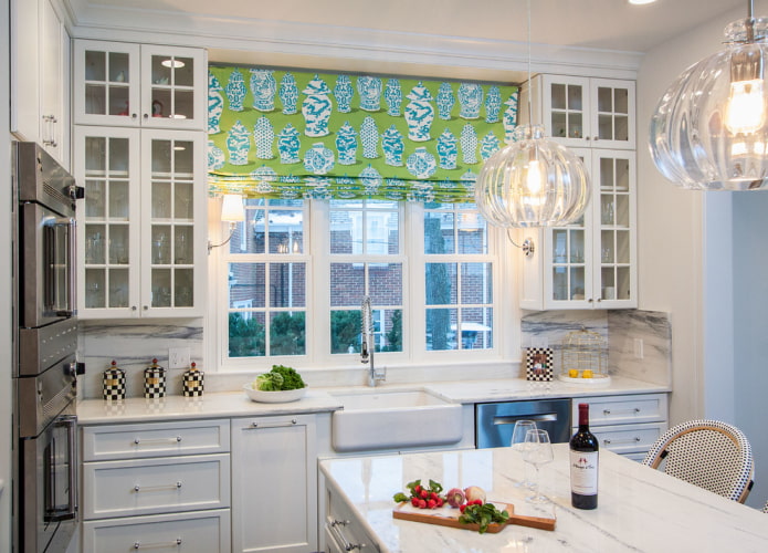 green patterned roman curtains in the kitchen