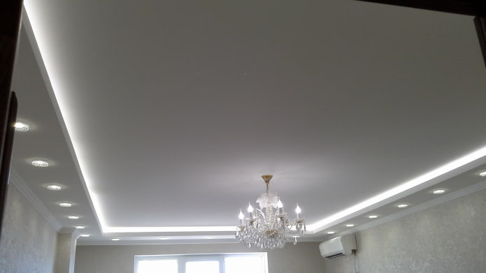 ceiling with LED strip and recessed spotlights