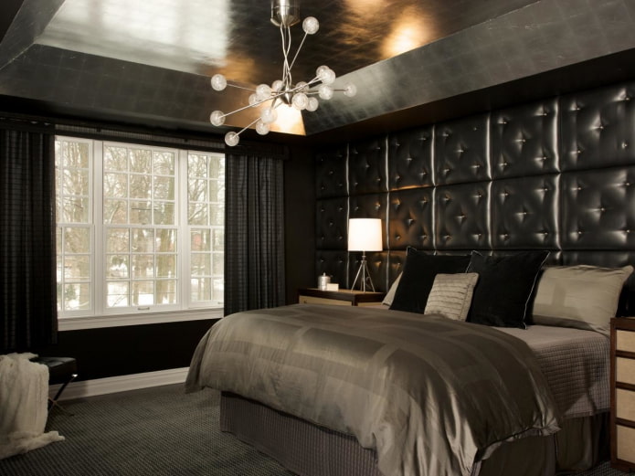 gray ceiling with black walls
