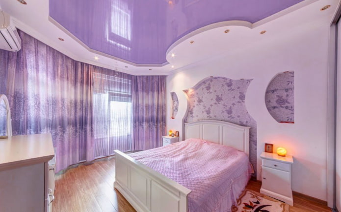 lilac stretch ceiling in the bedroom