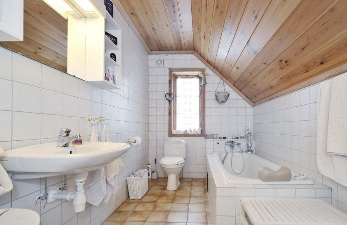 wooden ceiling in the bathroom on the attic floor