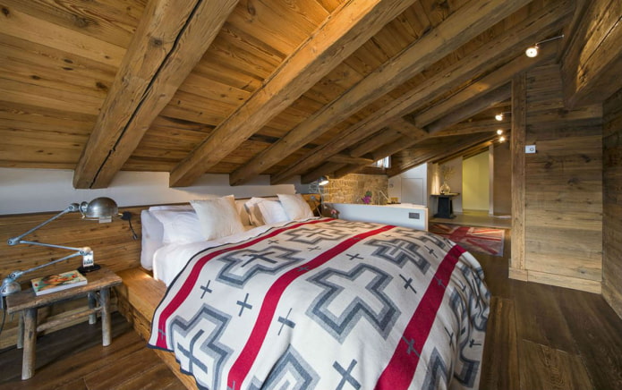chalet-style wooden ceiling structure in the attic