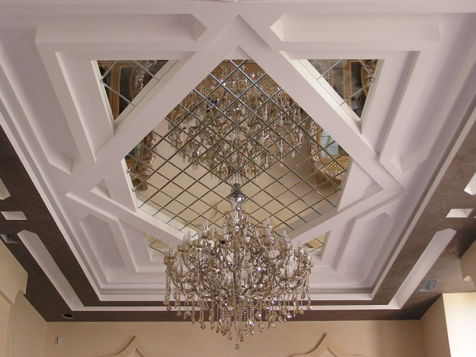 mirrored ceiling construction with chandelier