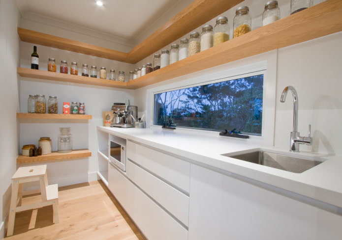 open shelves on the wall in the kitchen