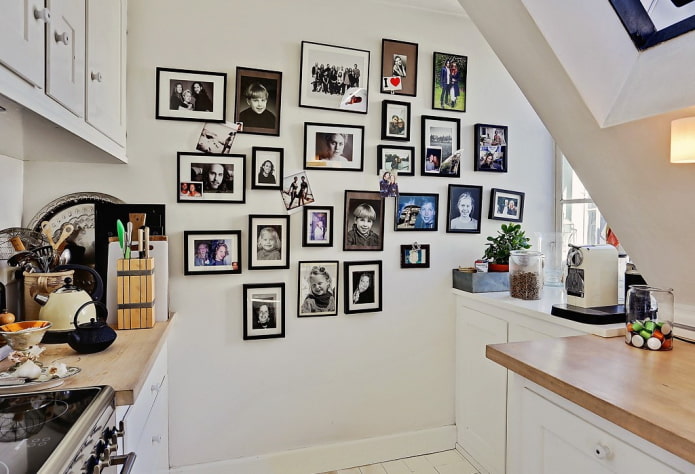 photos on the wall in the interior of the kitchen