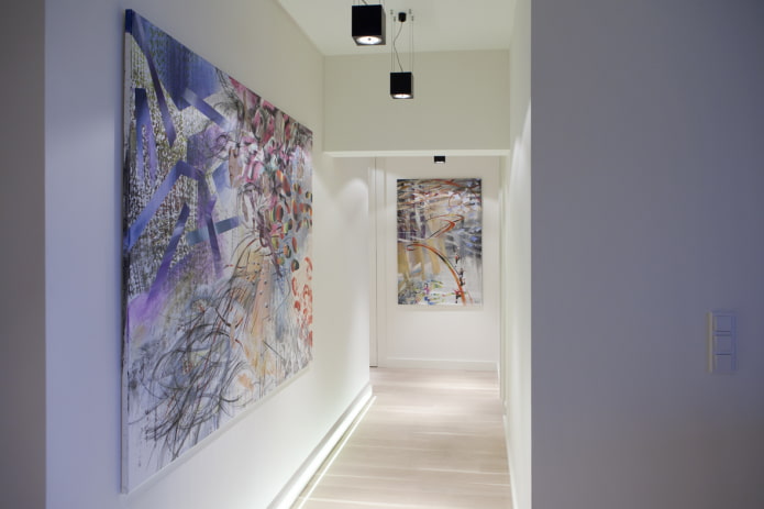 abstract paintings in the interior of the corridor