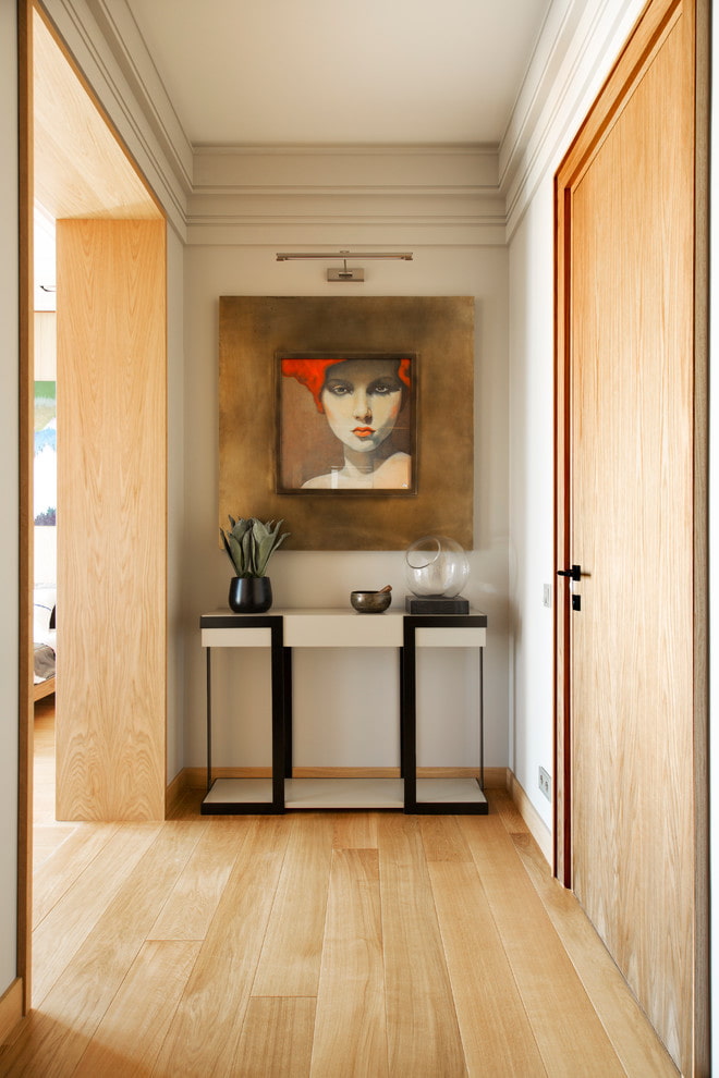 painting in the interior of a modern hallway