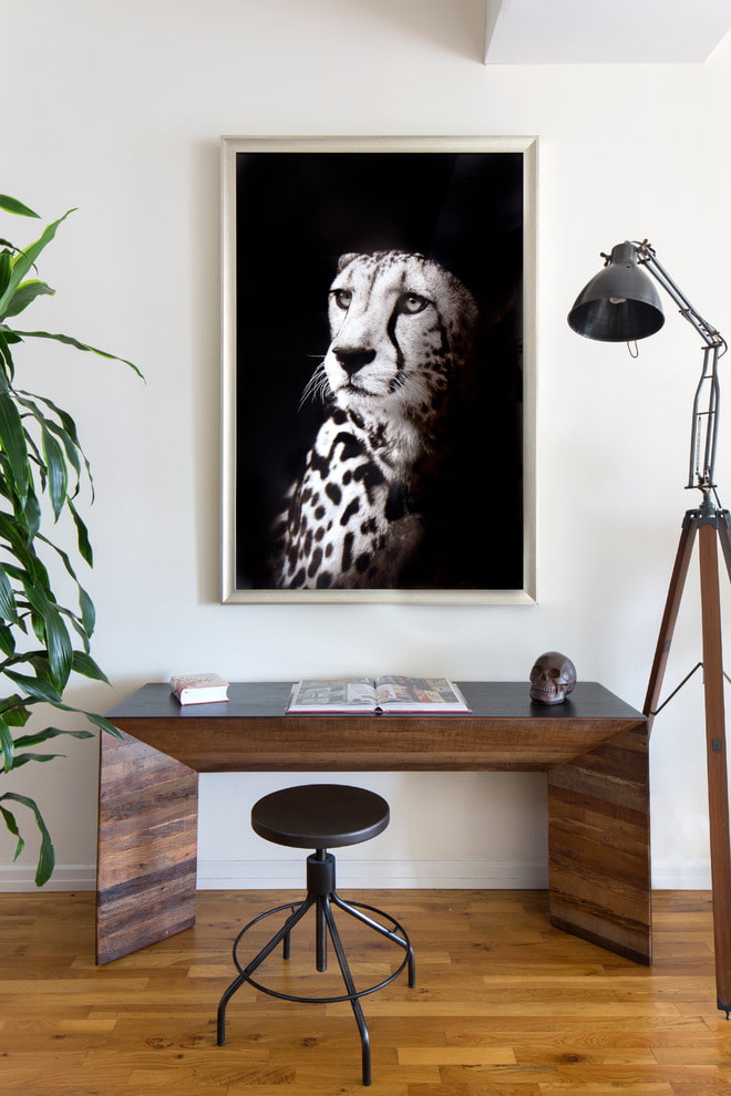 painting with a picture of a cheetah in the interior