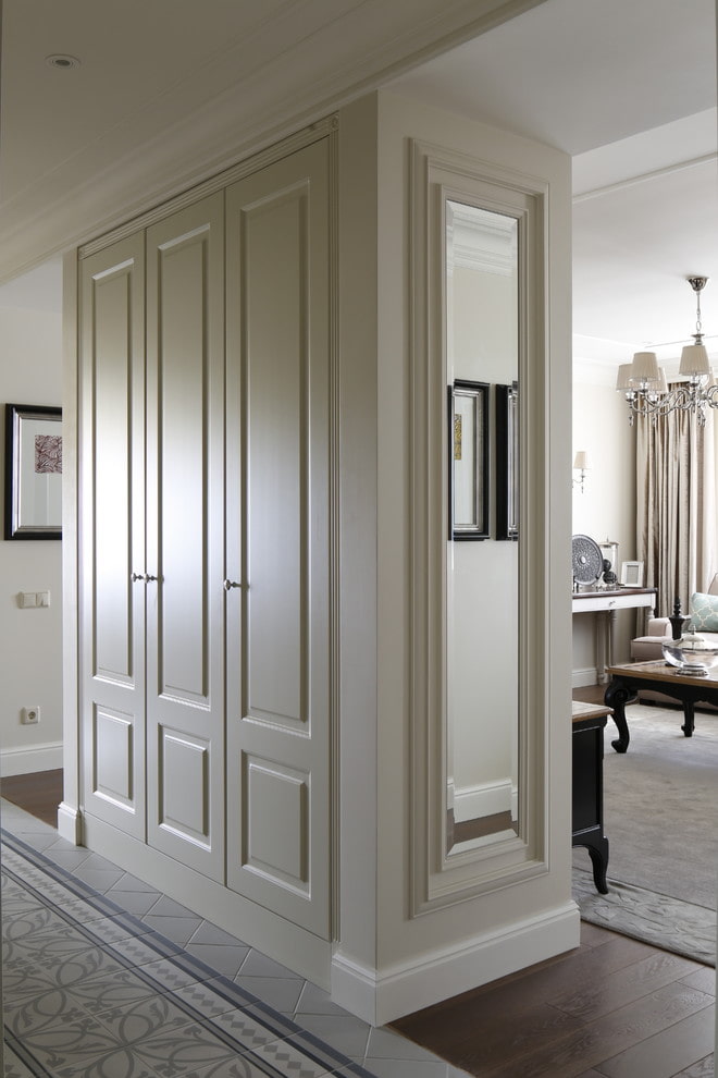 rectangular wardrobe in the form of a partition in the interior