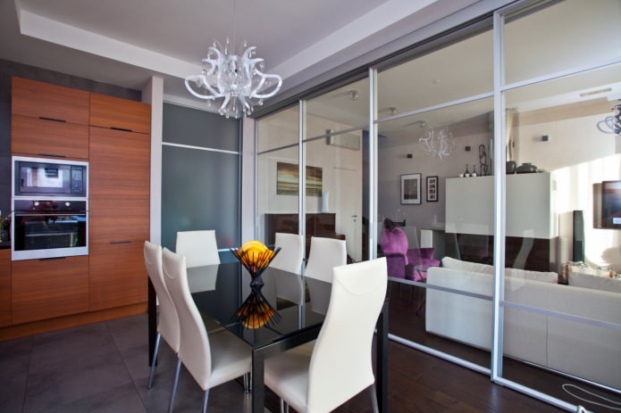 glass partition in the interior of the kitchen-living room