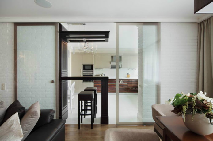 transparent partition in the interior of the kitchen-living room
