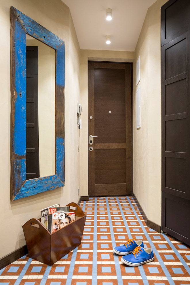 rectangular mirror in the interior of the hallway