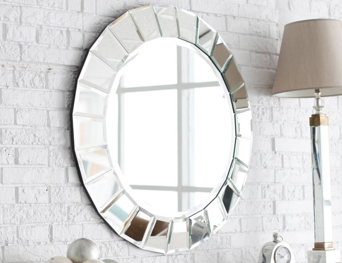 round faceted mirror in the interior