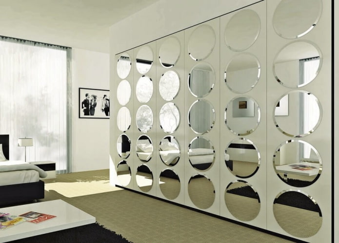 round faceted mirrors in the interior