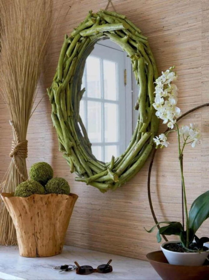 mirror decorated with tree branches