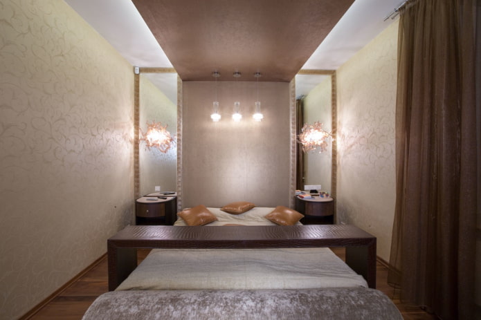 mirrors with sconces in the interior of the bedroom