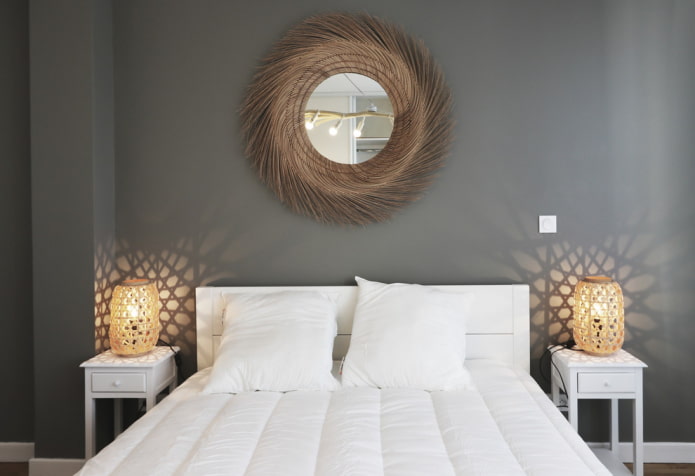 mirror with decorative frame in the bedroom