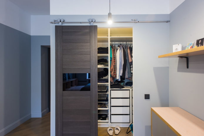 dressing room with sliding door in the interior