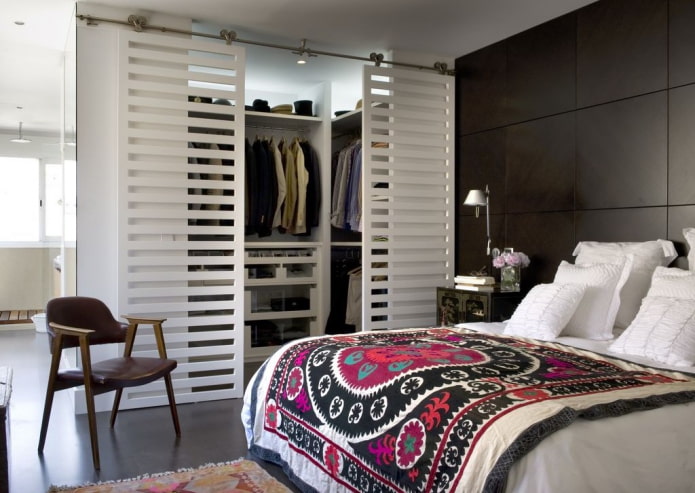 dressing room with plastic doors in the interior of the bedroom