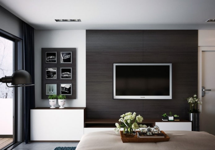 wall-mounted TV in silver housing