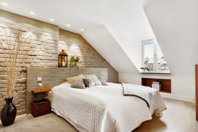 sloped walls in the interior of the bedroom